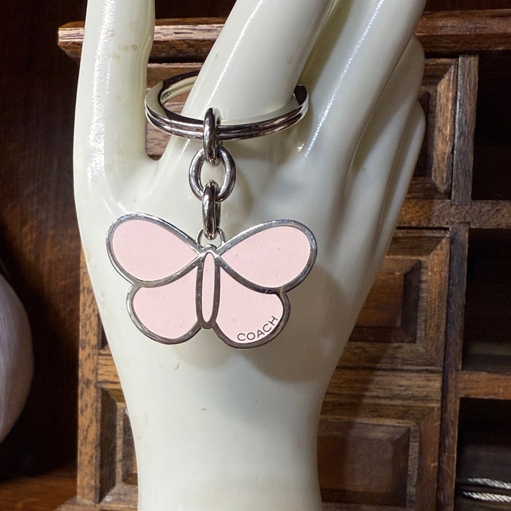 NWOT Vintage and Rare Coach Pink Butterfly Keychain.